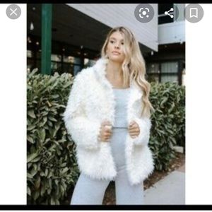 Kittenish fuzzy coat